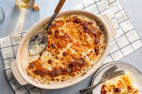 scalloped potatoes in baking dish and on a plate