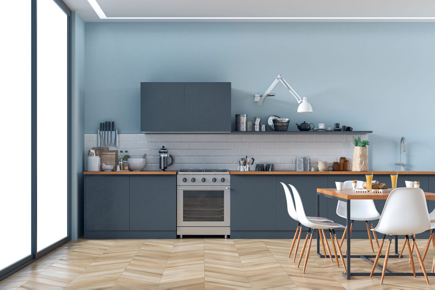 Blue-toned kitchen with blue cabinets, wood floors, light blue wall