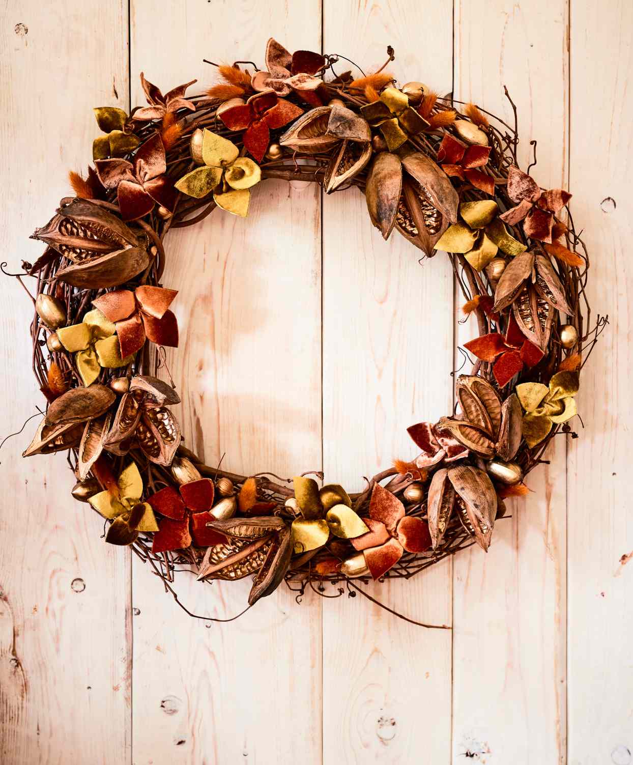 autumnal wreath on wooden door
