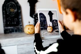 child watching Halloween content on tablet