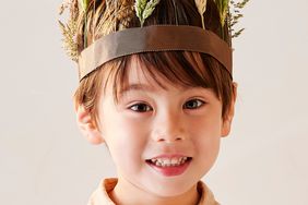 child wearing craft crown