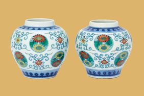 pair of Chinese doucai Qing dynasty 'lotus and chrysanthemum' jars 