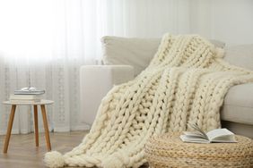 chunky knit blanket over chair