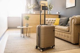 Beige suitcase in living room