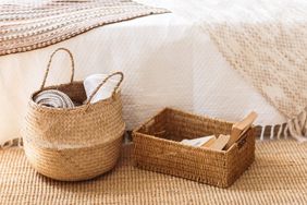 wicker baskets on bedroom floor