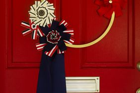 patriotic fourth of july wreath on red door