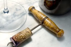 Corkscrew on marble table