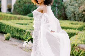 bride wearing strapless off-the-shoulder long sleeve wedding dress