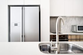 modern fridge and freezer in kitchen