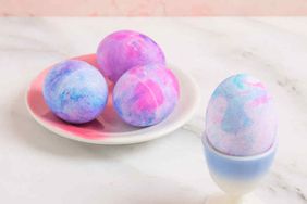 dyed easter eggs shaving cream on plate and egg dish