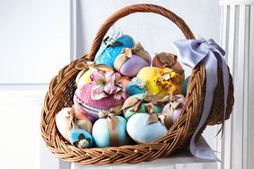 large easter basket with decorated eggs