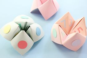 paper fortune tellers on blue surface