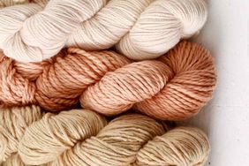four assorted colors of dyed yarn