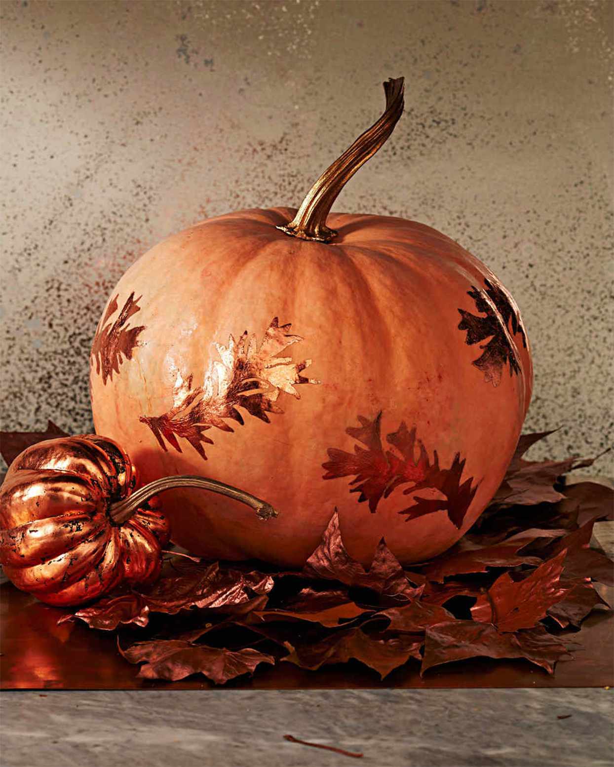 pumpkin decorated with gilded leaves