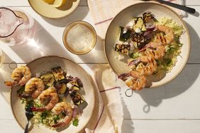 shrimp skewers with chopped zucchini salad