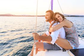 Honeymooners Smiling on Boat Ride