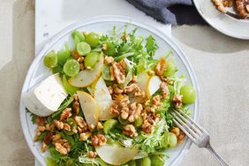healthy salad with grapes, walnuts, and apples