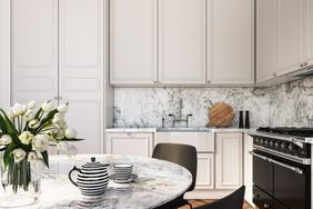 Interior design of elegant kitchen with black and white elements