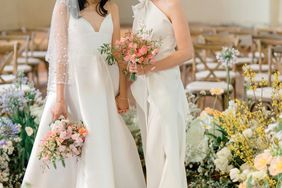 brides standing at wedding altar