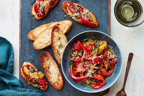 Marinated Peppers With Mint and Sesame on blue cutting board