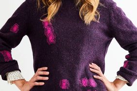 woman wearing a mended sweater