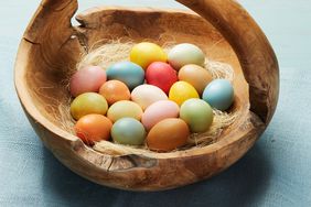 naturally dyed easter eggs in a wooden basket