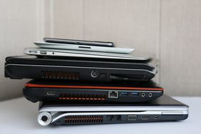stack of old laptops