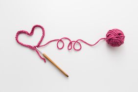 pink yarn crocheted into a heart