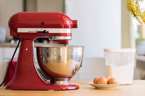 Red stand mixer on kitchen counter