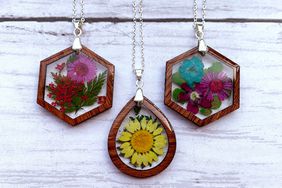 resin flower pendants on wood suface