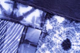assortment of layered blue dyed fabrics