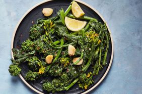 simply sauteed broccoli rabe healthy sidedish on blue table
