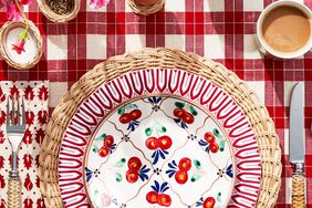 tablescape with checkered tablecloth and rattan flatware