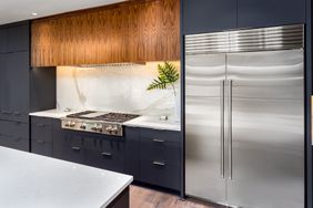 Modern kitchen with stainless steel freezer refrigerator 